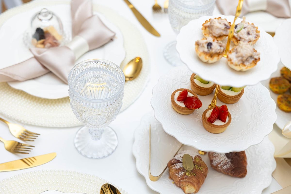 Mini charcuterie board under glass cloche dome at each place setting
