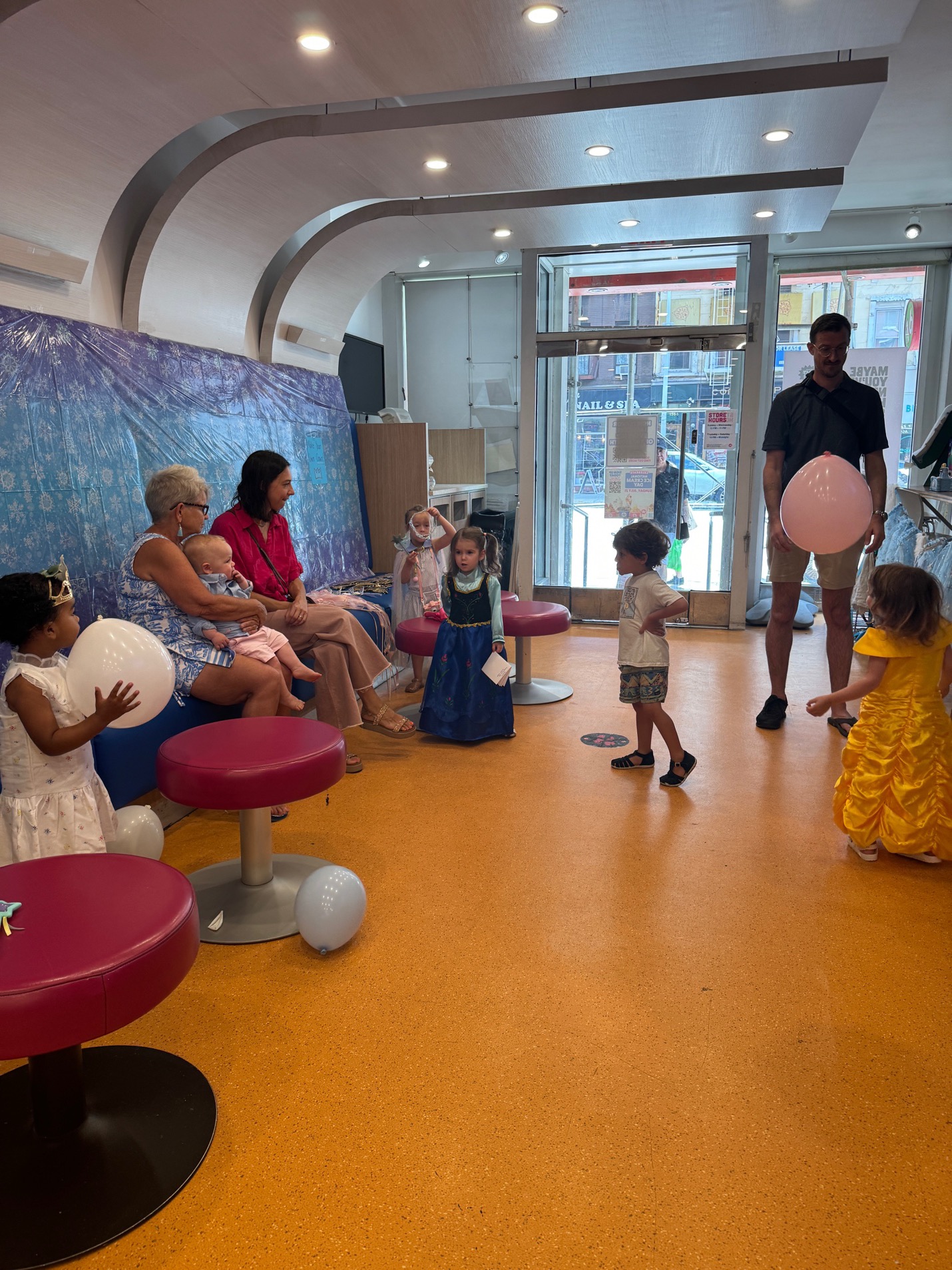 The party room at 16 Handles with Frozen-themed walls and decorations